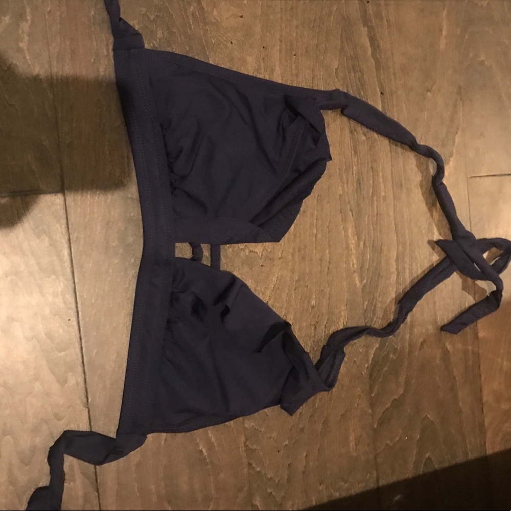 Dark blue halter bikini top with ruffles and tie back